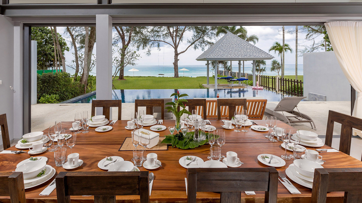 twin-villas-natai-5-twin-villas-natai-north-villa-dining-table-5b30994423c9a