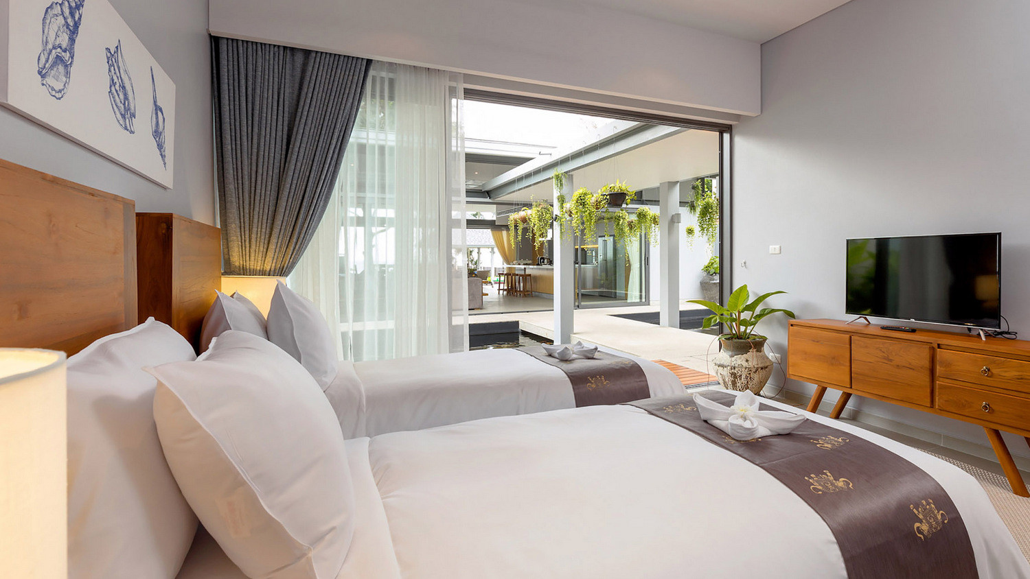 twin-villas-natai-9-twin-villas-natai-north-villa-twin-bedroom-c-5b30995b7f6e2