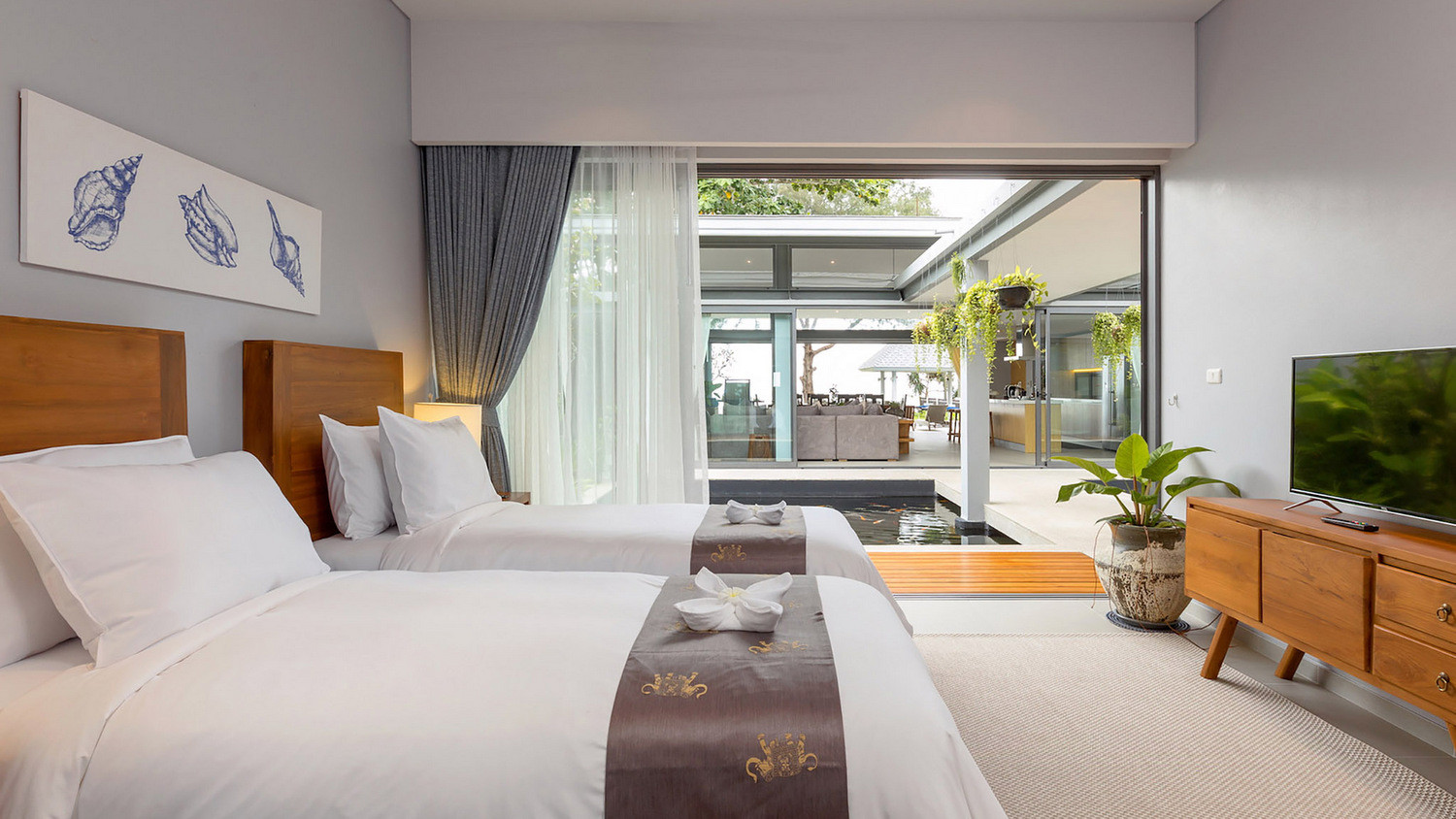 twin-villas-natai-twin-villas-natai-north-villa-bedroom-c-outlook-5b3099be6e474