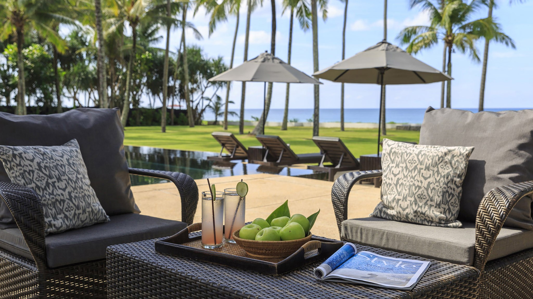 Outdoor sala and lounging at Shanti Villa, a luxury 6 bedroom beach front villa located in Jivana private estate, Phang Nga, Thailand